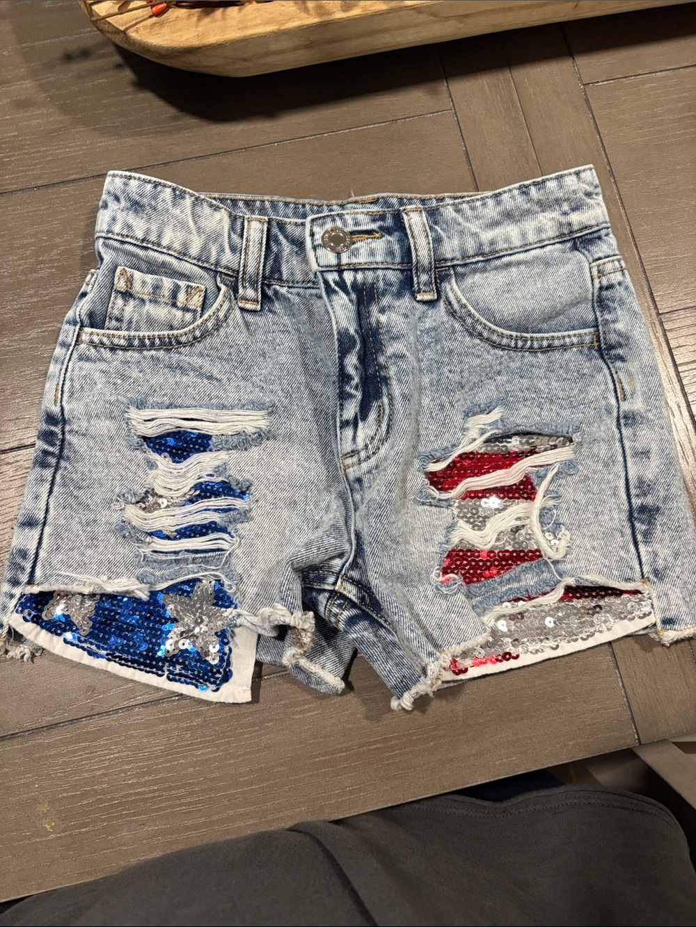 The Limited Light Wash Denim Shorts with Red & Blue Sequin Patches